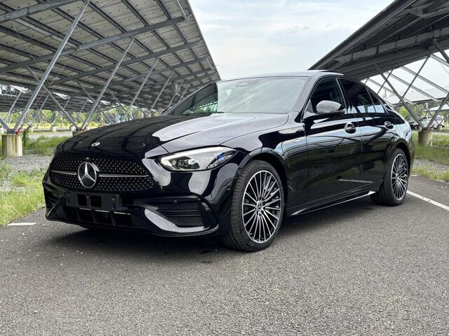 Mercedes-Benz C-KLASSE 300 e Business Solution AMG | Night | Panoramadak | Digital light | Memory stoelen | 19" Multispaaks velgen | Sfeerverlichting |