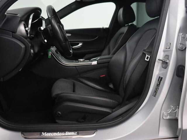 Mercedes-Benz C-KLASSE 180 Avantgarde | Stoelverwarming | Half leder | Park Assist | Navigatie | Full LED | Cruise control | Comfortstoelen | Climate control