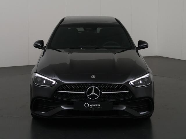 Mercedes-Benz C-KLASSE Estate 180 Business Solution AMG | Panoramadak | Trekhaak | Digital Light | Memory stoelen | Actieve dodehoek | 360 camera | Trekhaak | Night pakket | Apple carplay