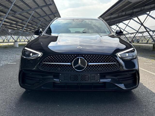 Mercedes-Benz C-KLASSE 180 Star Edition AMG Line | Panoramadak | Memory stoelen | 360 camera | Digital light | Sfeerverlichting |