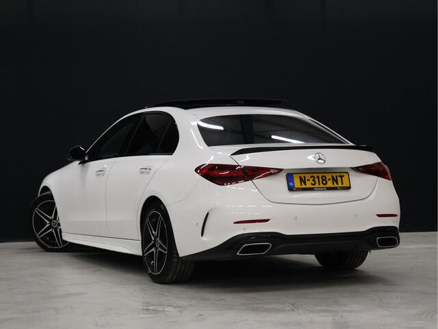 Mercedes-Benz C-KLASSE 200 4MATIC AMG Line [SCHUIFKANTELDAK, ADAPTIVE CRUISE CONTROL, BURMESTER, ELEKTRISCHE STOELEN, 360 CAMERA, SFEERLICHT, CARBON, URBAN GUARD+, NIEUWSTAAT]