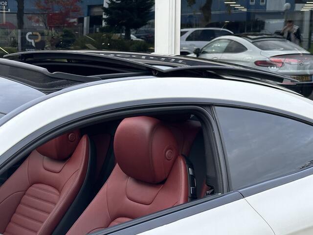 Mercedes-Benz C-KLASSE Coupé 180 AMG-Line | Luchtvering | Burmester | Panodak | 360 camera