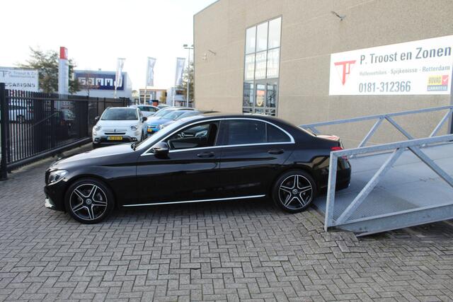 Mercedes-Benz C-KLASSE 180 Premium Plus Lederen sportstoelen/Led lampen/Parkeersensoren/Trekhaak/Spiegel en stoelverwarming/Cruise control/Navigatie/Climate control/Licht metalen velgen