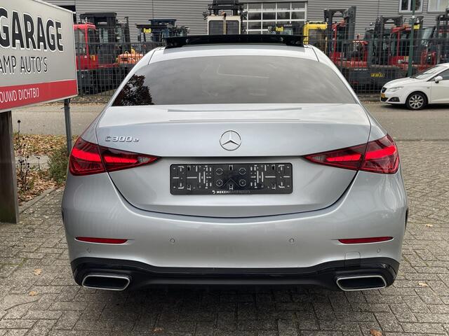 Mercedes-Benz C-KLASSE 300 e AMG Line 18"/Leder/Panoramadak/360 camera/Dodehoek/Keyless/Stoelverwarming + memory l + r/Sfeerverlichting premium/Apple Carplay & Android Auto