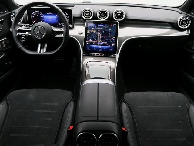 Mercedes-Benz C-KLASSE Estate 300 e AMG Plug-In Hybride AMG Line | Panorama Schuif-Kanteldak | Burmester® | Parkeerpakket met 360°-camera | Alarm | Head-up display. Inclusief 24 maanden MB Certified garantie voor Europa.