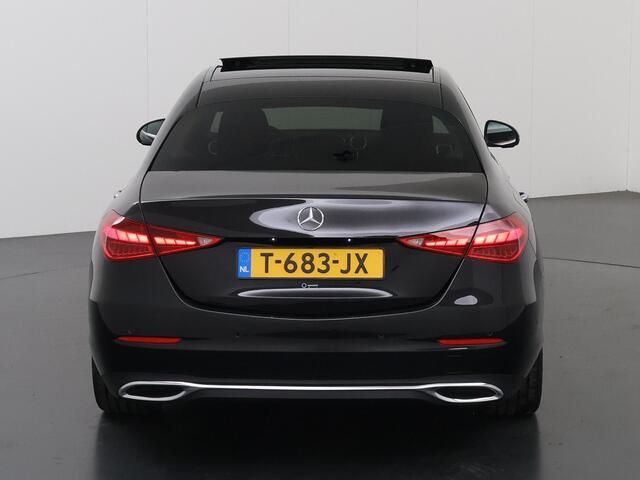 Mercedes-Benz C-KLASSE 180 AMG Line | Panoramadak | 360 camera | Draadloos laden |