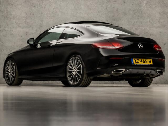 Mercedes-Benz C-KLASSE Coupé 180 AMG Sport 157Pk Automaat (SCHUIFDAK, NAVIGATIE, STOELVERWARMING, LEDER/ALCANTARA, ZWART HEMEL, SPORTSTOELEN, FLIPPERS, LED KOPLAMPEN, NIEUWE APK, NIEUWSTAAT)