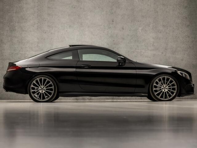 Mercedes-Benz C-KLASSE Coupé 180 AMG Sport 157Pk Automaat (SCHUIFDAK, NAVIGATIE, STOELVERWARMING, LEDER/ALCANTARA, ZWART HEMEL, SPORTSTOELEN, FLIPPERS, LED KOPLAMPEN, NIEUWE APK, NIEUWSTAAT)