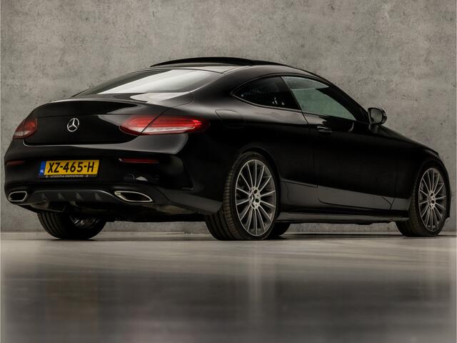Mercedes-Benz C-KLASSE Coupé 180 AMG Sport 157Pk Automaat (SCHUIFDAK, NAVIGATIE, STOELVERWARMING, LEDER/ALCANTARA, ZWART HEMEL, SPORTSTOELEN, FLIPPERS, LED KOPLAMPEN, NIEUWE APK, NIEUWSTAAT)