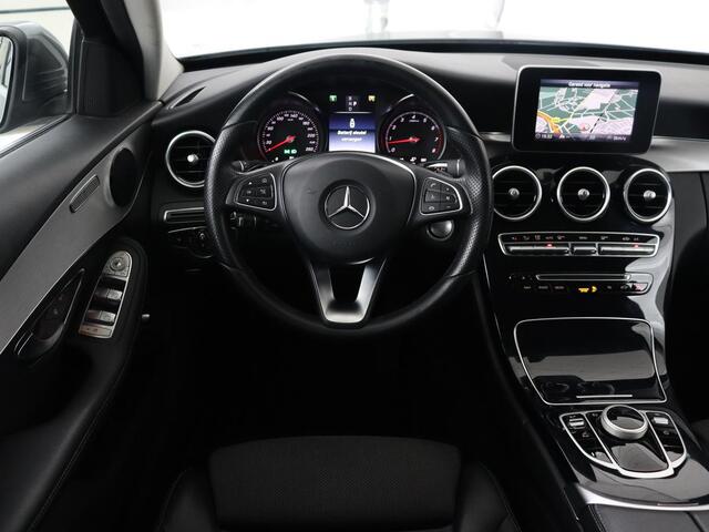 Mercedes-Benz C-KLASSE 180 Business Solution | Stoelverwarming | Trekhaak | Camera | Navigatie | Park Assist | Half leder | Climate control | Full LED | Cruise control | Dodehoek detectie