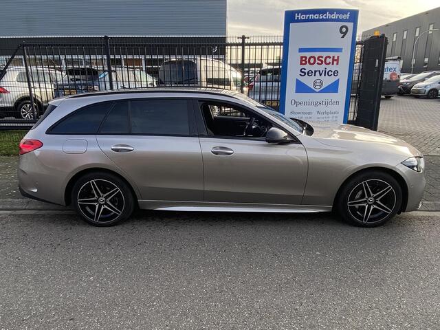 Mercedes-Benz C-KLASSE Estate 300 e 4MATIC AMG Line met o.a. laser LED, HUD, sfeer, trekh., stoel-/stuurverwarming, etc.