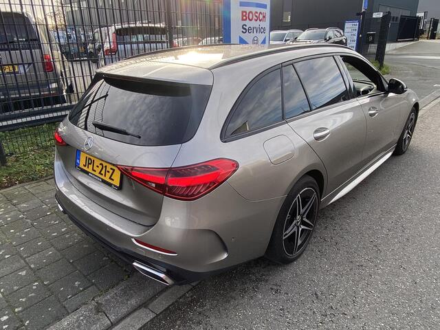Mercedes-Benz C-KLASSE Estate 300 e 4MATIC AMG Line met o.a. laser LED, HUD, sfeer, trekh., stoel-/stuurverwarming, etc.