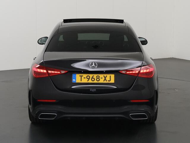 Mercedes-Benz C-KLASSE 180 AMG Line | Night | Panoramadak | Stoelverwarming | Achteruitrijcamera | 19" lichtmetalen velgen |