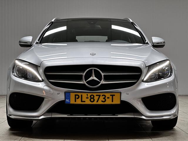 Mercedes-Benz C-KLASSE Estate 180 AMG Business Solution/ AMG-Pakket/ Panorama-Dak/ 18''LMV/ Zwarte-Hemel/ Camera/ Elek. Stoelen/ LED Koplampen/ Sportstoelen/ Elek. Kofferklep/ Bluetooth/ Multi. Sportstuur.