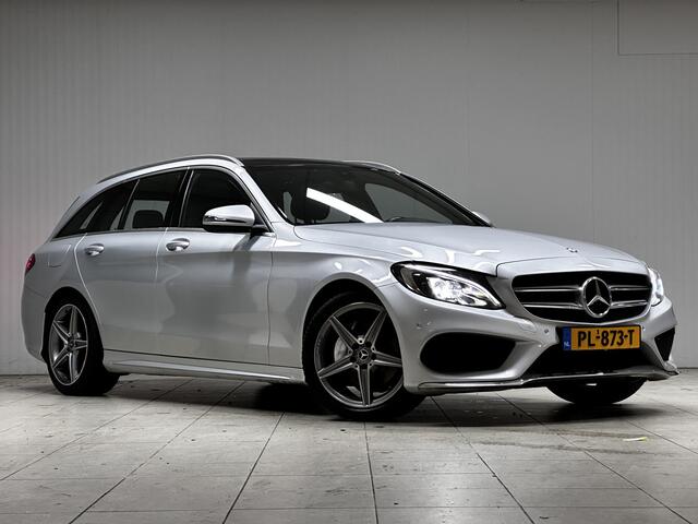Mercedes-Benz C-KLASSE Estate 180 AMG Business Solution/ AMG-Pakket/ Panorama-Dak/ 18''LMV/ Zwarte-Hemel/ Camera/ Elek. Stoelen/ LED Koplampen/ Sportstoelen/ Elek. Kofferklep/ Bluetooth/ Multi. Sportstuur.