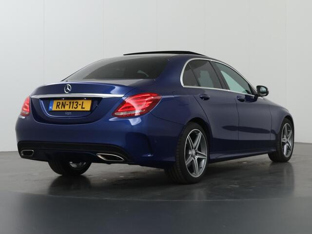 Mercedes-Benz C-KLASSE 180 Business Solution | AMG | Panoramadak | Lederen bekleding | Achteruitrijcamera | High Performance koplampen | Navigatie |