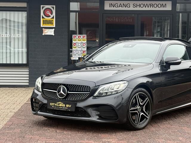 Mercedes-Benz C-KLASSE Coupé 200 AMG Line night pakket 184 pk pano navi climate ctr cruise ctr camera Burmester Keyl-go leder lmv 18 inch dealer onderhouden