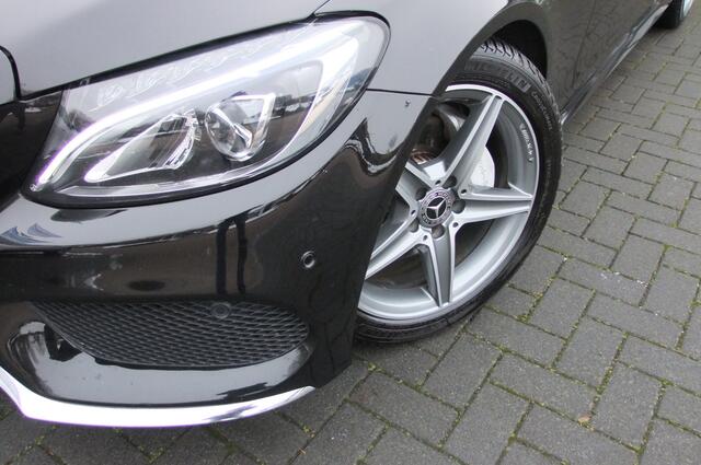 Mercedes-Benz C-KLASSE 180 Business Solution AMG/ 9G/ LED/ All-season/ Stoelverwarming/ Dodehoek assist/ Camera