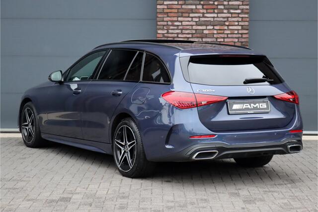Mercedes-Benz C-KLASSE Estate 300 e AMG Line Aut9 | Panoramadak | Distronic | Memory | Trekhaak | Advanced Sound System | Camera | Dodehoekassistent | Nightpakket |