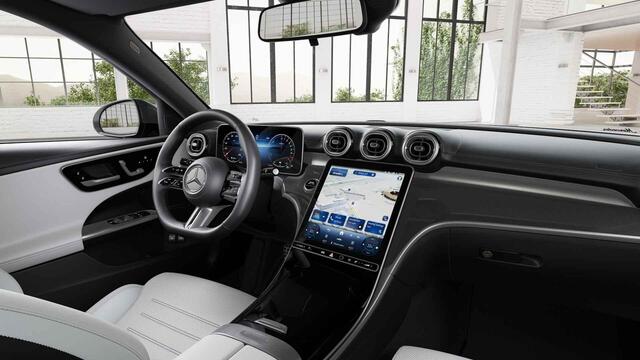 Mercedes-Benz C-KLASSE Estate 300e Business Solution AMG | Panoramaschuifdak | Dodehoekassistent | Memorypakket | 360° camera | Stoelverwarming |