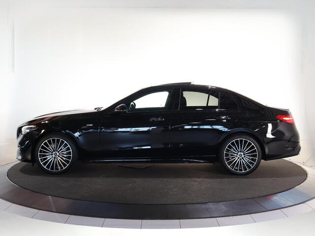 Mercedes-Benz C-KLASSE 300e Business Solution AMG | Panoramaschuifdak | Nightpakket | Digital Light | 19" LM velgen | Dodehoekassistent | 360° camera | Stoelverwarming | Sfeerverlichting |