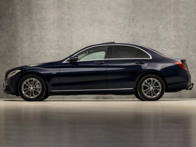 Mercedes-Benz C-KLASSE 350 e Sport 279Pk Automaat (SCHUIFDAK, NAVIGATIE, LUCHTVERING, CAMERA, GETINT GLAS, ELEK SPORTSTOELEN, STOELVERWARMING, SFEERVERLICHTING, NIEUWE APK, NIEUWSTAAT)
