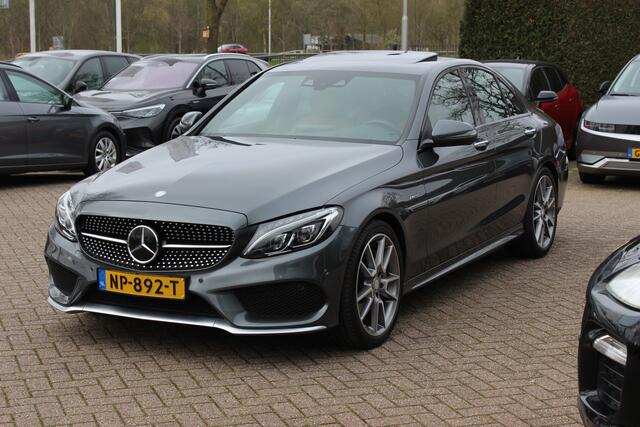 Mercedes-Benz C-KLASSE 450 AMG 4MATIC / Schuifdak / Camera / Head-up / Designo Leder / Sfeerverlichting / 19'' / Burmester / Memory seats / Keyless / Dodehoek / DAB / Stoelverwarming / Cruise Control / Alarm Klasse 3 / COMAND