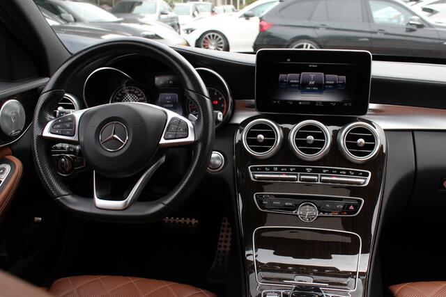 Mercedes-Benz C-KLASSE 450 AMG 4MATIC / Schuifdak / Camera / Head-up / Designo Leder / Sfeerverlichting / 19'' / Burmester / Memory seats / Keyless / Dodehoek / DAB / Stoelverwarming / Cruise Control / Alarm Klasse 3 / COMAND