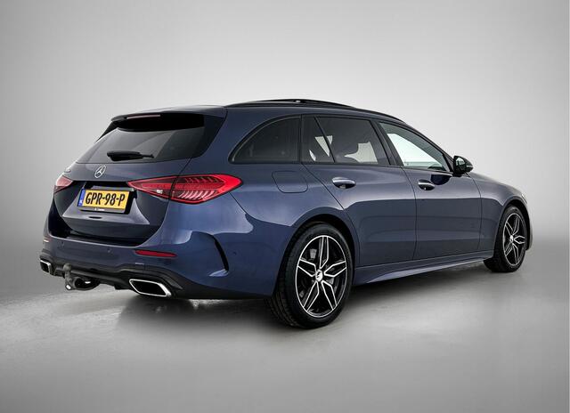 Mercedes-Benz C-KLASSE Estate 300 e AMG Plug-In Hybride AMG Line | Night Pakket | Panorama Schuif-Kanteldak | Trekaak | Parkeerpakket met 360°-camera. Inclusief 24 maanden MB Certified garantie voor Europa.