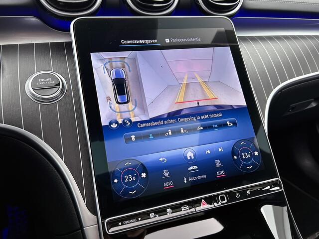 Mercedes-Benz C-KLASSE Estate 300 e AMG Plug-In Hybride AMG Line | Night Pakket | Panorama Schuif-Kanteldak | Trekaak | Parkeerpakket met 360°-camera. Inclusief 24 maanden MB Certified garantie voor Europa.