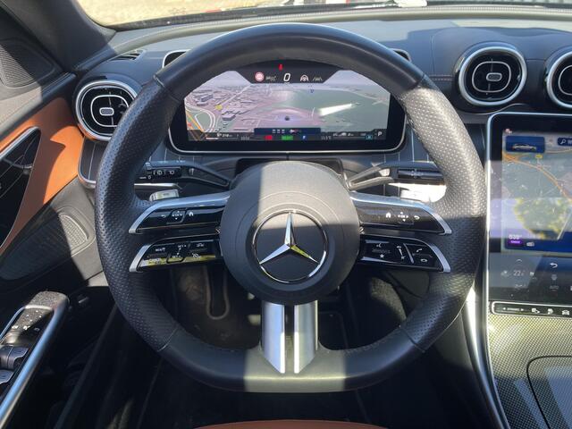 Mercedes-Benz C-KLASSE Estate 300 e Star Edition AMG Line 18"/Panoramadak/Trekhaak/Stuur + stoelverwarming/Adaptieve cruise/Dodehoek/Sfeerverlichting premium/Elektrische klep/Apple Carplay & Android Auto