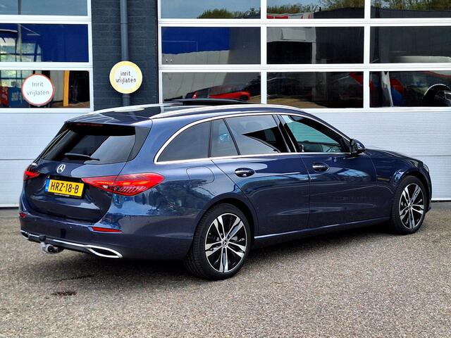 Mercedes-Benz C-KLASSE Estate 300 e Luxury Line | Leder Beige | Panoramadak | Winter Pakket | Trekhaak | DIGITAL LIGHT | DISTRONIC Afstandsassistent | 360° Camera | Stuurverwarming | Apple CarPlay | Android Auto | Elektrisch Verstelbare Stoelen + Memory