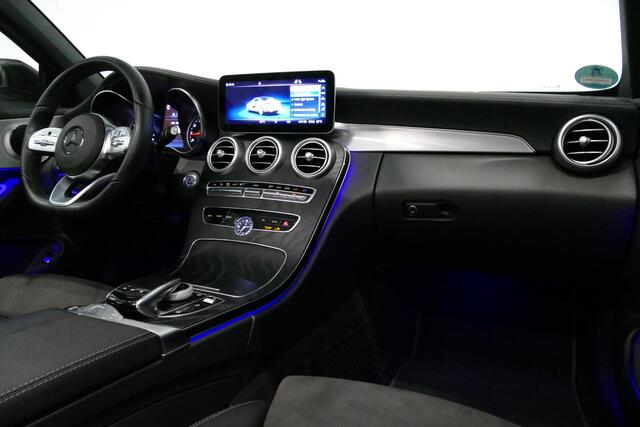 Mercedes-Benz C-KLASSE Cabrio 180 AMG Line / C63S AMG Diffuser / Nekverwarming - Airscarf / Panamericana Grille / Stoelverwarming / Apple Carplay - Android Auto / Full LED / Ambienteverlichting / Achteruitrijcamera / Cruise Control / Dodehoekdetectie / 20'' LMV