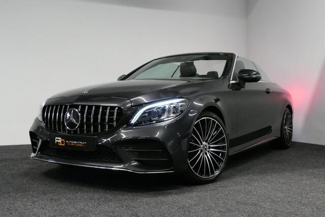 Mercedes-Benz C-KLASSE Cabrio 180 AMG Line / C63S AMG Diffuser / Nekverwarming - Airscarf / Panamericana Grille / Stoelverwarming / Apple Carplay - Android Auto / Full LED / Ambienteverlichting / Achteruitrijcamera / Cruise Control / Dodehoekdetectie / 20'' LMV