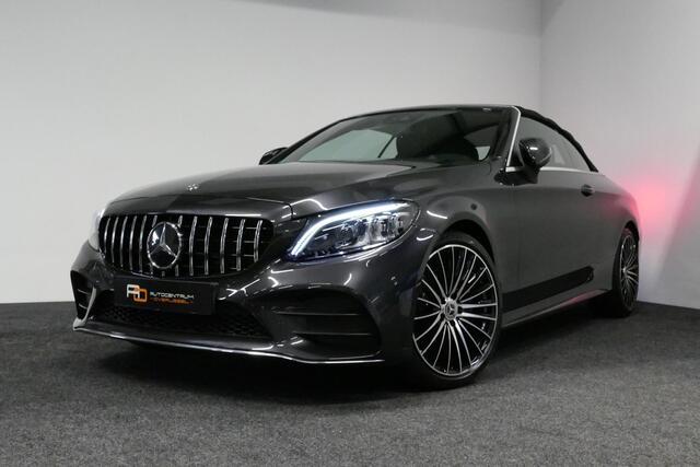 Mercedes-Benz C-KLASSE Cabrio 180 AMG Line / C63S AMG Diffuser / Nekverwarming - Airscarf / Panamericana Grille / Stoelverwarming / Apple Carplay - Android Auto / Full LED / Ambienteverlichting / Achteruitrijcamera / Cruise Control / Dodehoekdetectie / 20'' LMV