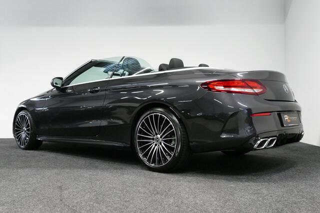 Mercedes-Benz C-KLASSE Cabrio 180 AMG Line / C63S AMG Diffuser / Nekverwarming - Airscarf / Panamericana Grille / Stoelverwarming / Apple Carplay - Android Auto / Full LED / Ambienteverlichting / Achteruitrijcamera / Cruise Control / Dodehoekdetectie / 20'' LMV