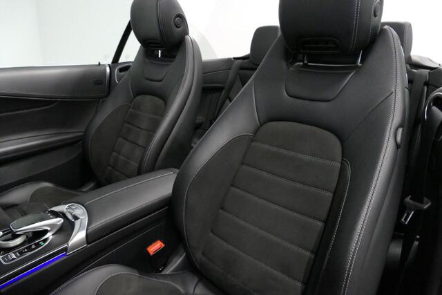 Mercedes-Benz C-KLASSE Cabrio 180 AMG Line / C63S AMG Diffuser / Nekverwarming - Airscarf / Panamericana Grille / Stoelverwarming / Apple Carplay - Android Auto / Full LED / Ambienteverlichting / Achteruitrijcamera / Cruise Control / Dodehoekdetectie / 20'' LMV