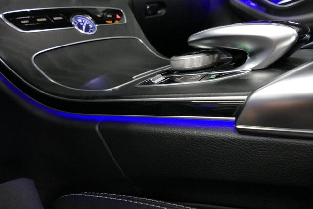 Mercedes-Benz C-KLASSE Cabrio 180 AMG Line / C63S AMG Diffuser / Nekverwarming - Airscarf / Panamericana Grille / Stoelverwarming / Apple Carplay - Android Auto / Full LED / Ambienteverlichting / Achteruitrijcamera / Cruise Control / Dodehoekdetectie / 20'' LMV