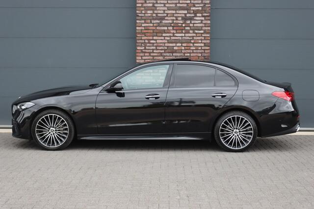 Mercedes-Benz C-KLASSE 300 e 4MATIC AMG Line | Distronic+ | Massage | Burmester | Panoramadak | Memory | Digital Light | HUD | Surround Camera | Augmented Reality | Verwarmd Stuurwiel |