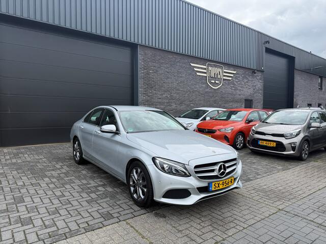 Mercedes-Benz C-KLASSE 180 Business Solution | 2E EIGENAAR | 12MND GARANTIE | AUTOMAAT | CRUISE | LED | CAMERA | STOELVERW. | NAVI |