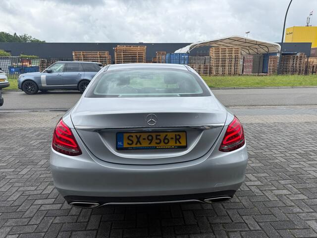 Mercedes-Benz C-KLASSE 180 Business Solution | 2E EIGENAAR | 12MND GARANTIE | AUTOMAAT | CRUISE | LED | CAMERA | STOELVERW. | NAVI |