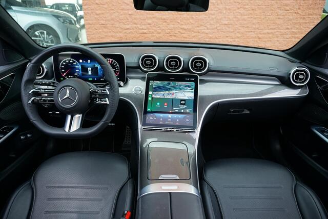Mercedes-Benz C-KLASSE Estate 300 e AMG Line *NL AUTO* PANO / TREKHAAK / LEDER / SFEERVERLICHTING
