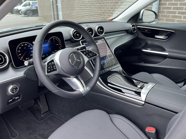 Mercedes-Benz C-KLASSE 300 e Business Line | Panoramadak | Donkergetint Glas Achter | Apple CarPlay | Android Auto | Sfeerverlichting | Stoelverwarming | Parkeersensoren | Achteruitrijcamera | Elektrisch Inklapbare Buitenspiegels