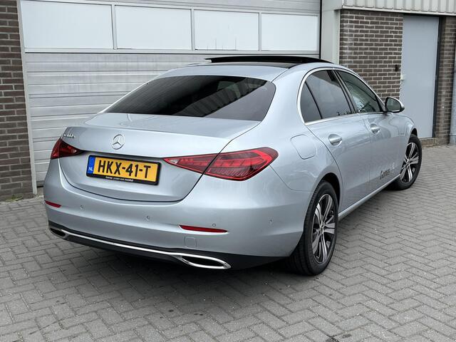Mercedes-Benz C-KLASSE 300 e Business Line | Panoramadak | Donkergetint Glas Achter | Apple CarPlay | Android Auto | Sfeerverlichting | Stoelverwarming | Parkeersensoren | Achteruitrijcamera | Elektrisch Inklapbare Buitenspiegels