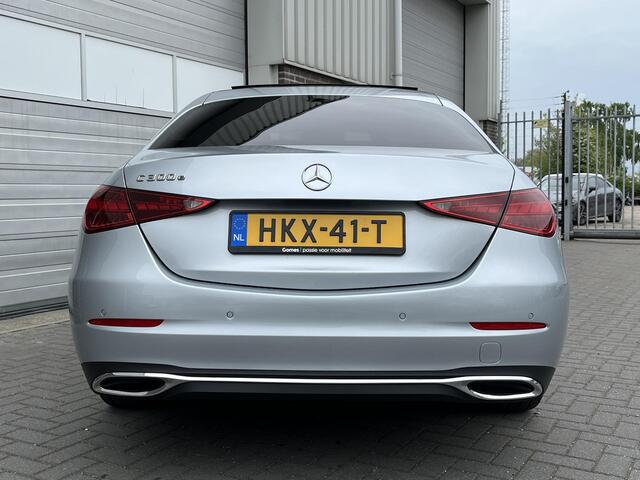 Mercedes-Benz C-KLASSE 300 e Business Line | Panoramadak | Donkergetint Glas Achter | Apple CarPlay | Android Auto | Sfeerverlichting | Stoelverwarming | Parkeersensoren | Achteruitrijcamera | Elektrisch Inklapbare Buitenspiegels