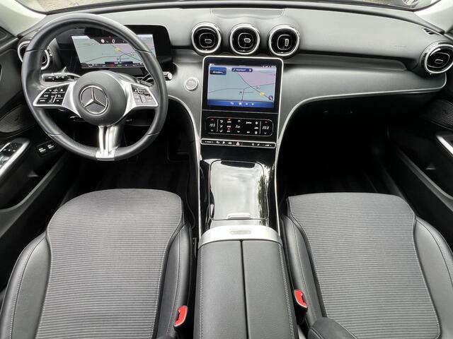 Mercedes-Benz C-KLASSE Estate 300 e Luxury Line / Dealer onderhouden / 1.800 kg elektrische trekhaak / Elektrische stoelen & Achterklep / Navi / Apple Carplay Android / 17" LM wielen /