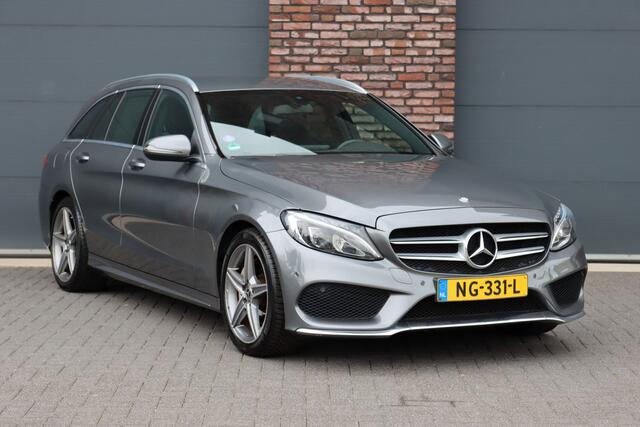 Mercedes-Benz C-KLASSE Estate 180 AMG Sport Edition | Dealer onderhouden | Zonnerollo's | Navigatie | Stoelverwarming | Leder | Cruise Control |