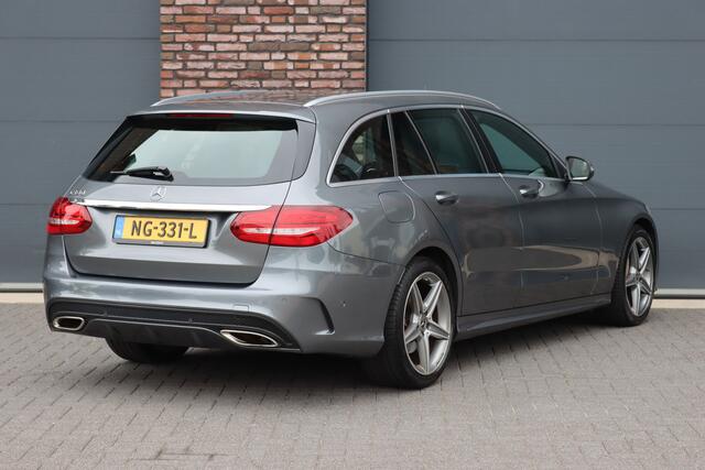 Mercedes-Benz C-KLASSE Estate 180 AMG Sport Edition | Dealer onderhouden | Zonnerollo's | Navigatie | Stoelverwarming | Leder | Cruise Control |