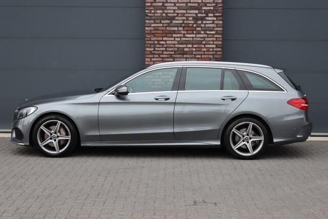 Mercedes-Benz C-KLASSE Estate 180 AMG Sport Edition | Dealer onderhouden | Zonnerollo's | Navigatie | Stoelverwarming | Leder | Cruise Control |