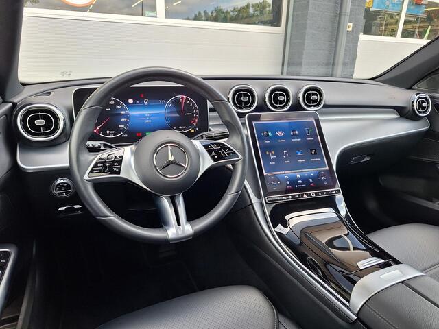 Mercedes-Benz C-KLASSE Estate 300 e Luxury Line | Panoramadak | Trekhaak Afneembaar | Achteruitrijcamera | Memory pakket | Dodehoekassistentie | Stoelverwarming | Sfeerverlichting | Elektrisch Bedienbare Achterklep